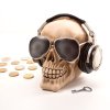 Sporkasa - Lebka s okuliarmi a slúchadlami