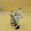 Soška " Tanec. Dívka a Rudý Kavalerista ". Starožitný porcelán.