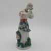 Dívka s květem. Soška. Porcelán.