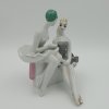 Dvě Baleríny, na přestávce. Sousoší. Porcelán.