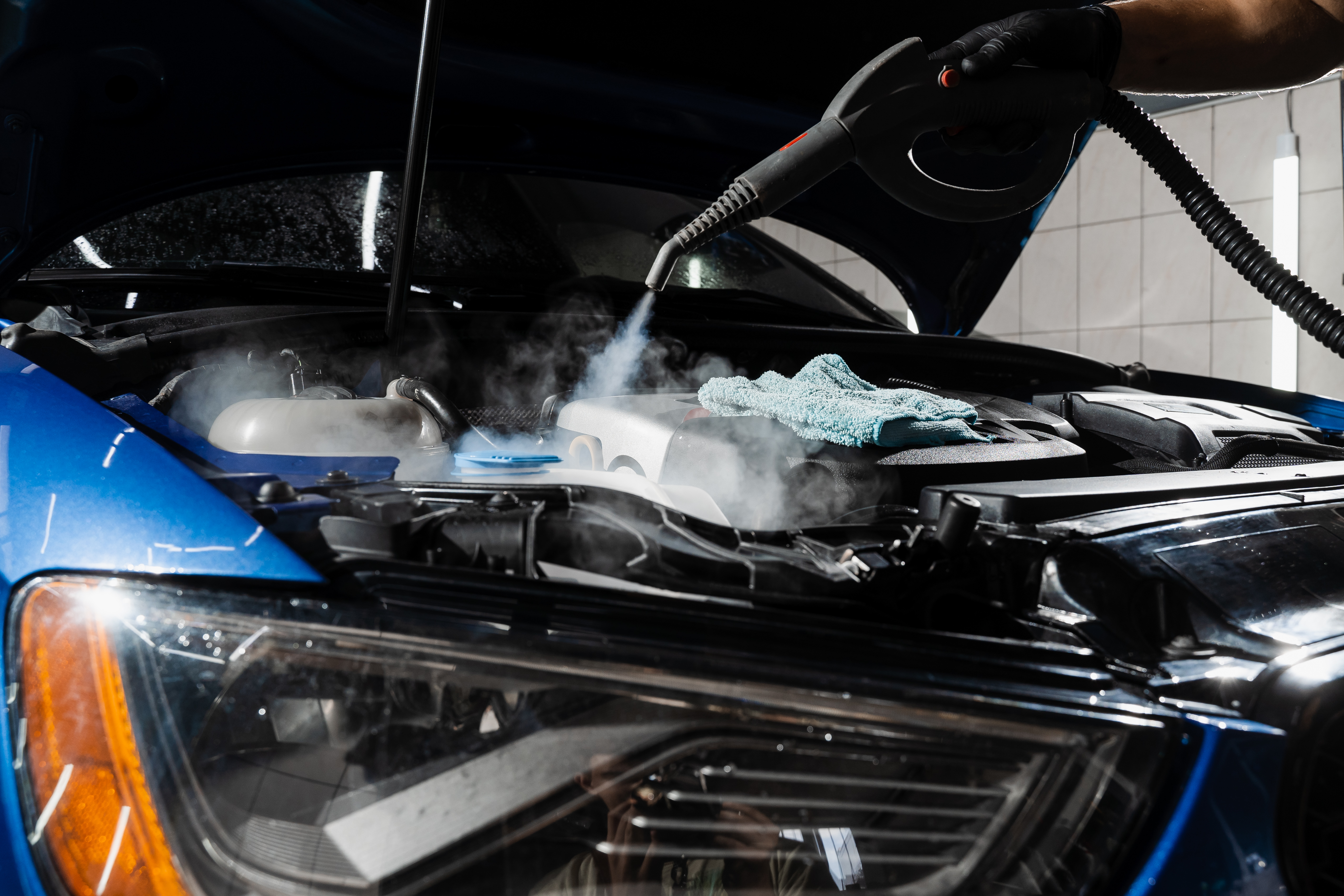 steaming-washing-motor-auto-detailing-auto-service-process-steam-cleaning-car-engine-from-dust-dirt