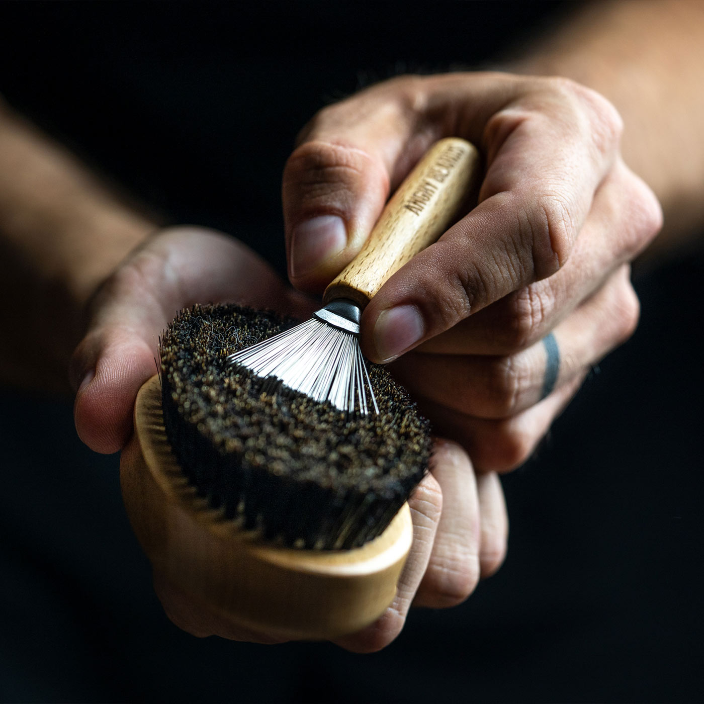 Cleans brushes from tangled beards