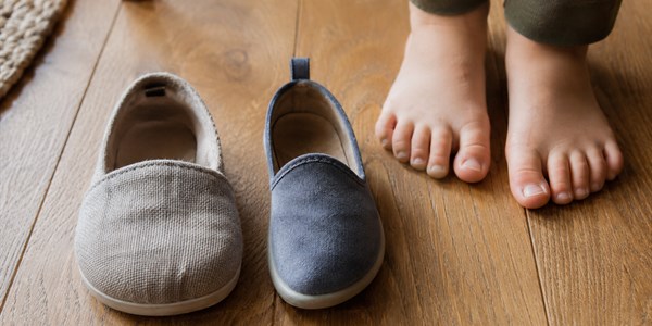 Child’s shoes fit in length but pinch the toes: why shape matters
