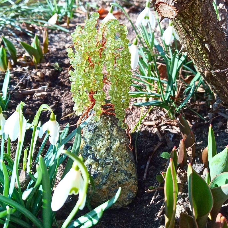 Hand-wired Tree of Life named Green Willow in blooming spring garden