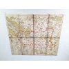 Staré skládací papírové mapy v pouzdře