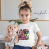 t shirt mockup of a girl holding two stuffed animals 31683