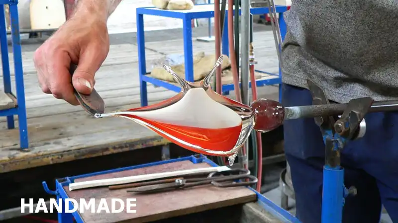 Our e-shop offers unique hand-shaped coloured glass pieces.