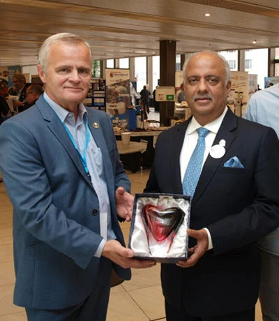 Glass gift to Rotary International President.