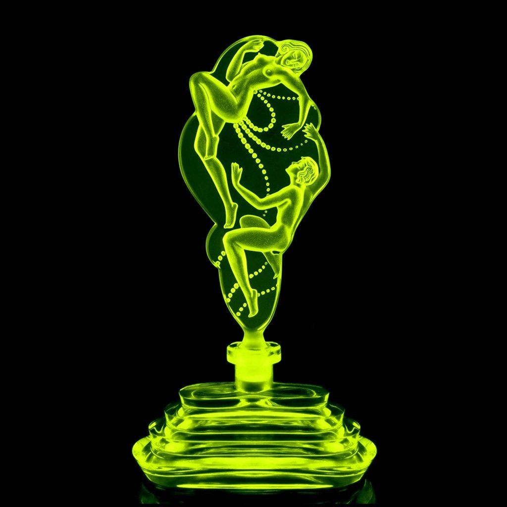 Vintage Art Deco Czech nude perfume bottle Eroticon in vaseline uranium glass by Hoffmann glowing under UV light
