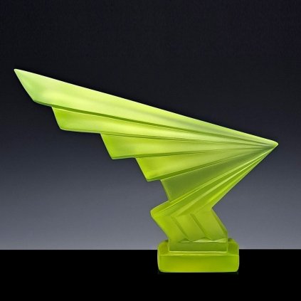 Art Deco lightning hood ornament made of uranium glass with strong green UV glow