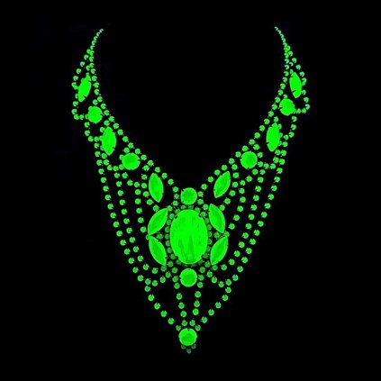 uranium glass medallion draped necklace glowing green under UV light