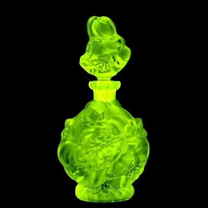 Uranium vaseline glass Art Deco perfume bottle by H. Hoffmann with “Poppies” floral relief, strong UV-glowing uranium glass – artdeco1930.com