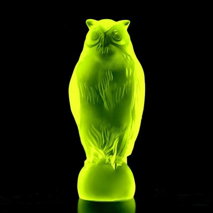 Uranium glass Art Deco tall owl figurine by H. Hoffmann glowing under UV light