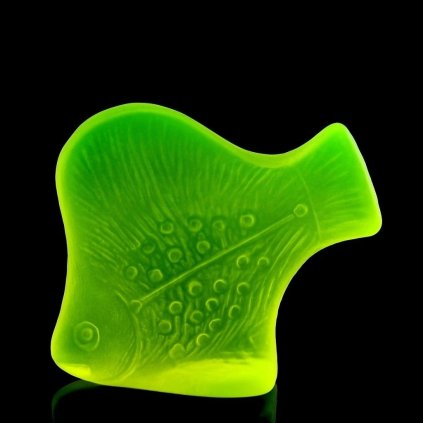 Art Deco Bohemian uranium glass angelfish figurine with stylized fins and strong neon UV glow