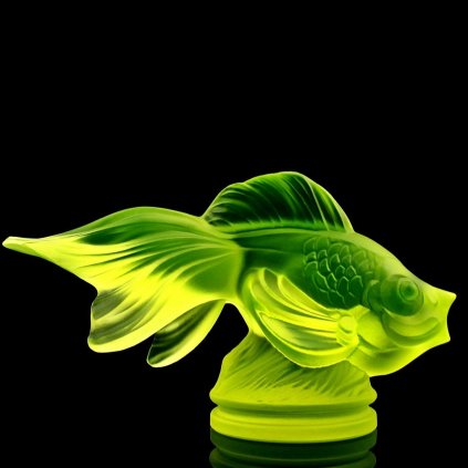 Uranium glass Art Deco fish figurine with flowing fins and strong green UV glow