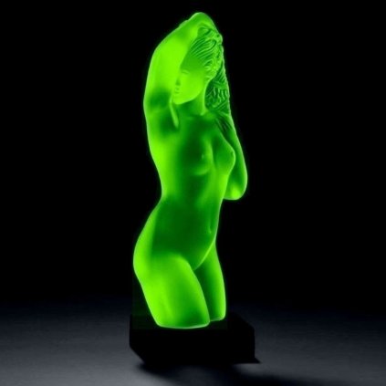 Art Deco nude lady figurine in green uranium glass by H. Hoffmann on black glass base with strong UV glow
