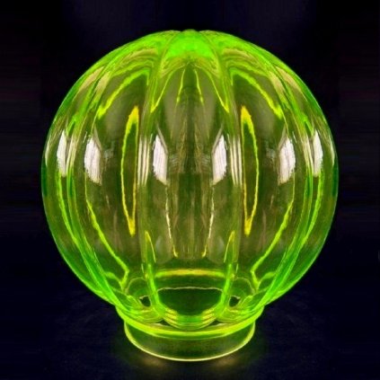 Art Deco ribbed globe uranium vaseline glass lamp shade glowing under UV light