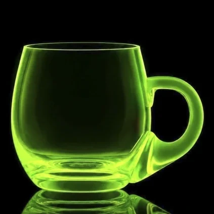 Czech Vaseline uranium glass large mug glowing under UV light