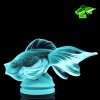 Uranium glass Art Deco fish figurine glowing green under UV light, confirming uranium glass composition