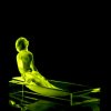 Uranium vaseline glass Art Deco rectangular bowl with seated nude lady in bath, Lalique-style modeling, strong UV glow — artdeco1930.com