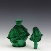Detail of 1930s H. Hoffmann Art Deco malachite glass perfume bottle stopper with floral relief