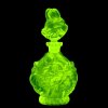 Yellow uranium glass Art Deco poppy relief perfume bottle with strong green UV glow