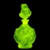 Uranium vaseline glass Art Deco perfume bottle by H. Hoffmann with “Poppies” floral relief, strong UV-glowing uranium glass – artdeco1930.com