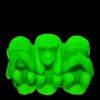 Bohemian uranium glass Three Wise Monkeys figurine glowing bright green under UV light
