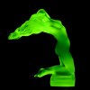 Art Deco nude female hood ornament made of green uranium glass by H. Hoffmann with strong UV glow