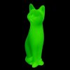 Side view of green uranium glass Art Deco sitting cat figurine by H. Hoffmann with UV glow