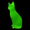 Detail of green uranium glass Art Deco sitting cat figurine by H. Hoffmann showing UV glow