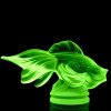 Side view of Art Deco fish figurine in green uranium glass by H. Hoffmann showing UV glow