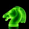 uranium glass hood ornament Longchamp showing green UV glow