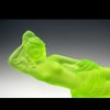Detail of yellow uranium glass Art Deco reclining nude lady figurine by H. Hoffmann with strong UV glow