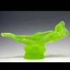 Side view of Art Deco reclining nude lady figurine made from yellow uranium glass, H. Hoffmann, UV reactive