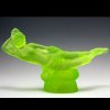 Uranium glass Art Deco reclining nude lady figurine by H. Hoffmann glowing under UV light