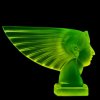 Side view of Art Deco Pharaoh head hood ornament in uranium glass with winged Egyptian profile