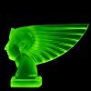 uranium glass hood ornament pharaoh head showing green UV glow