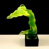 Art Deco nude female hood ornament car mascot in yellow uranium glass with black glass base glowing under UV light