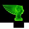 uranium glass hood ornament pharaoh head showing green UV glow