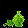 UV-glowing uranium vaseline glass perfume bottle with Bellflower relief by H. Hoffmann, neon green uranium glass – artdeco1930.com