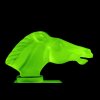 Detail of horse head Art Deco hood ornament in uranium glass