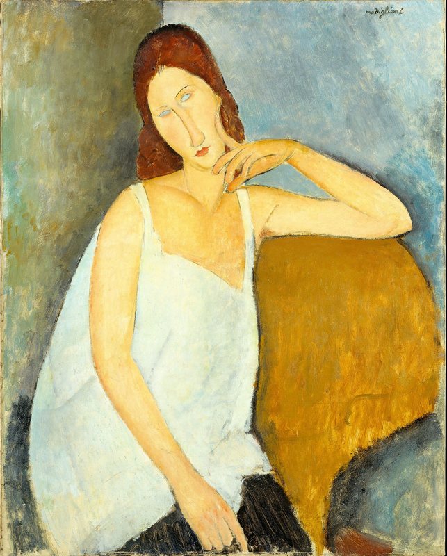 Jeanne Hébuternová od Amedea Modiglianiho, 1919 – mladá žena v bílé košilce sedí v křesle a opírá si tvář o ruku