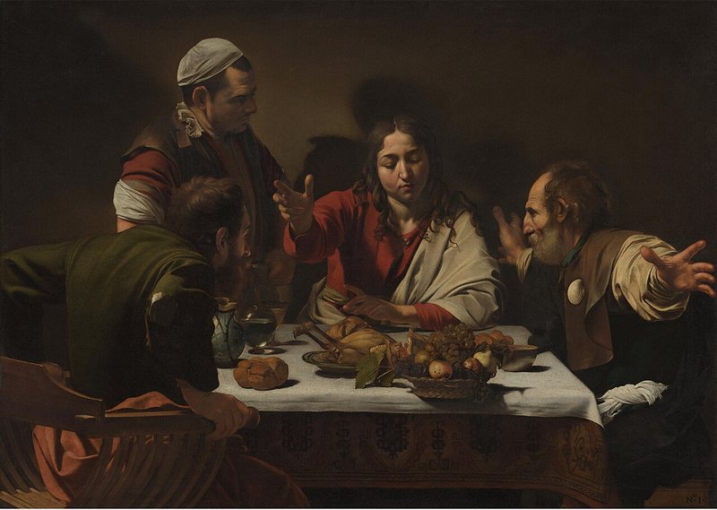 Večeře v Emauzích od Caravaggia, 1601 – mladý Kristus žehná u stolu, dva učedníci rozhazují rukama v úžasu