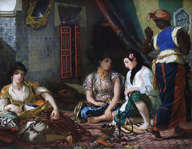 Alžírské ženy v jejich příbytku od Eugèna Delacroixe, 1834 – tři ženy v barevných šatech sedí v pokoji s kachlíky, vpravo stojí služebná