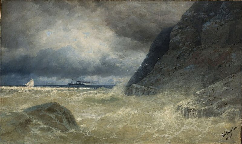 Moře od Ivana Ajvazovského, 1897 – rozbouřená voda u skalnatého pobřeží, na obzoru parník a plachetnice