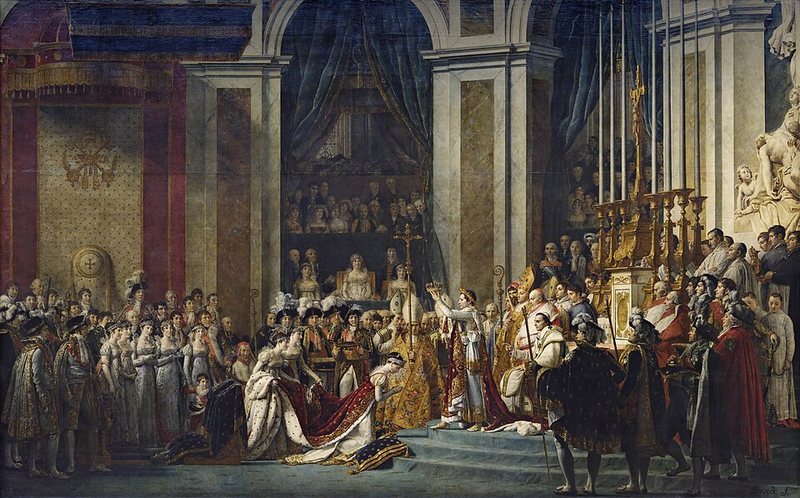 Korunovace Napoleona od Jacquese-Louise Davida, 1805–1807 – Napoleon korunuje klečící Josefínu v katedrále Notre-Dame před papežem a dvorem