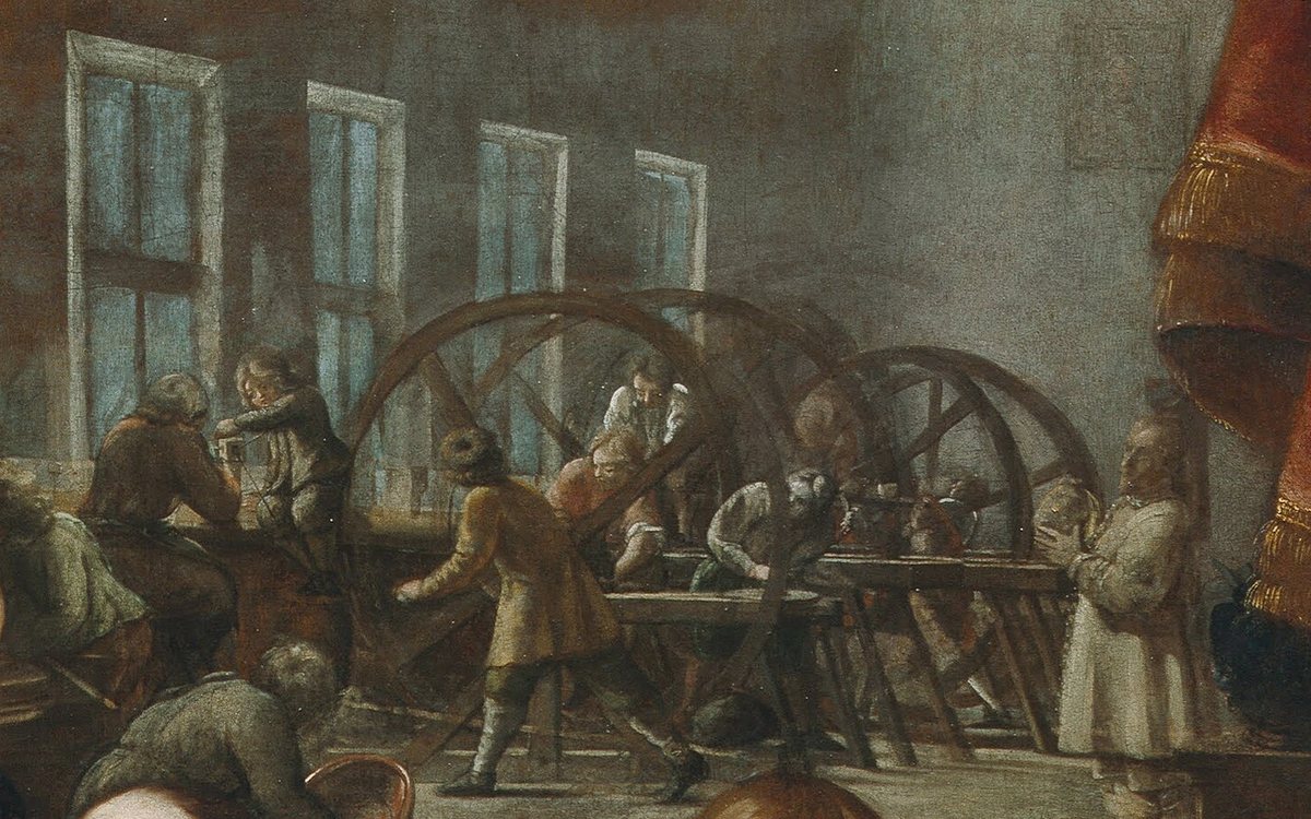 Detail obrazu rodiny Miseroni: dílna s vysokými okny, velkými koly brusek a pracujícími tovaryši