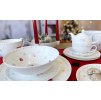 27401 3 porcelanova vanocni sada luna koleda s miskou talirem a cajovou soupravou na prostrenem stole