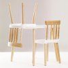 TV603 wooden round table and two chairs stacked
